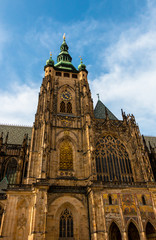 Fototapeta na wymiar St Vitus Cathedral facade in Hradcany Castle. Beautiful landmark in Prague, Czech Republic. Gothic architecture