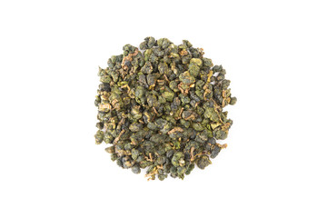 Fresh Tieguanyin Loose Oolong tea of high quality grade mountain growing  in circle pile on white table background for hot or cold drinks, close-up shot (top view, flat lay)