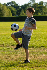 Pre-teen caucasian boy playing outside