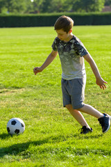 Pre-teen caucasian boy playing outside