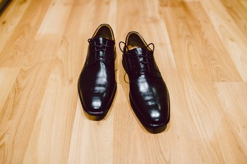 Elegant dark colored men shoes