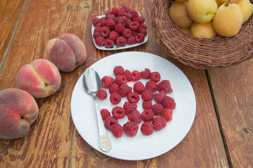 variety of fresh fruits. On a wooden table