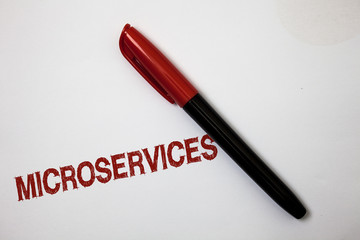 Writing note showing Microservices. Business photo showcasing Software development technique Decomposing an application Softliner pointer ink handwriting note pen stationery item paper work.