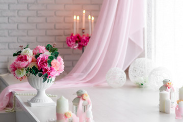 Beautiful decor of candles and flowers. White Pink shades.