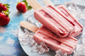 Delicious frozen homemade strawberry popsicles