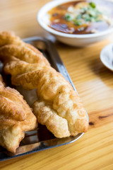 Chinese breakfast. Chinese deep fried dough and Jellied bean curd.