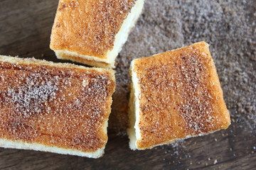 fresh sweet homemade delicious cake on wooden background