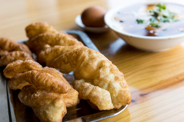 Chinese breakfast. Chinese deep fried dough and Jellied bean curd.
