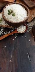Obraz na płótnie Canvas Basmati rice in a bowl with a spoon