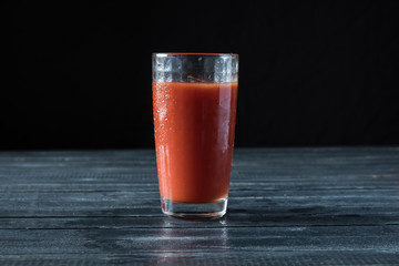 Red tomato and tomato juice