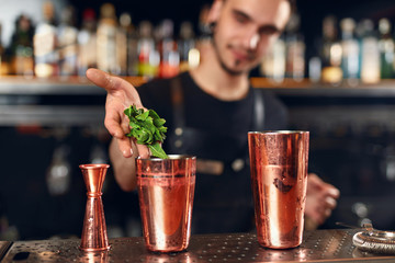 Cocktail Bar. Bartender Making Cocktails At Bar Counter