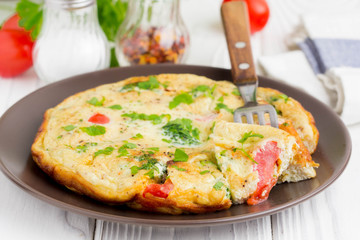 Omelet with broccoli and tomato, delicious healthy Breakfast, traditional morning food