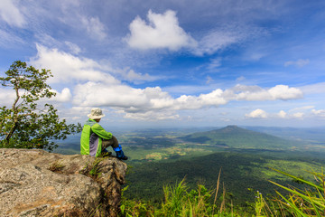 The hiking man touring on  high mountain in Loei province, Thailand.