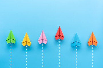 Paper plane on blue background, Business competition concept. - obrazy, fototapety, plakaty
