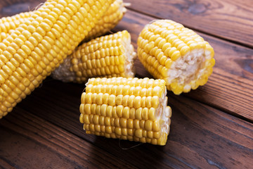 Fresh sweet corn on table