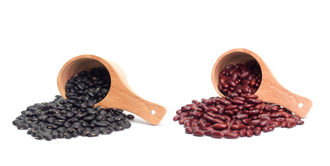 Black beans, red beans , Placed on a wooden spoon.
