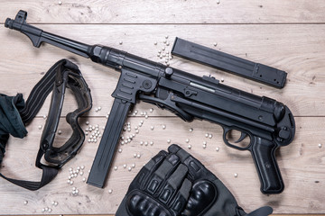 airsoft gun with protective glasses and lot of bullets