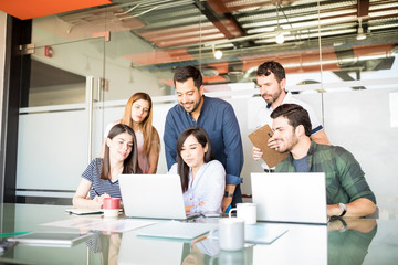 Obraz premium Business group working together in conference room