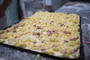 generic photos of Italian pizza preparation
