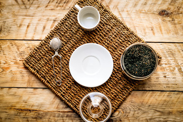Tea set on the wooden background  top view
