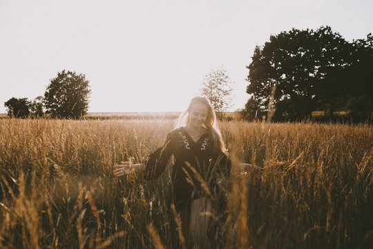Happy girl in the fields