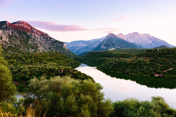 River Cedrino landscape view with mountains on the sunset