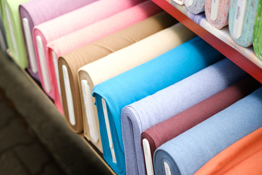 Colorful Fabric Rolls On Textile Market -