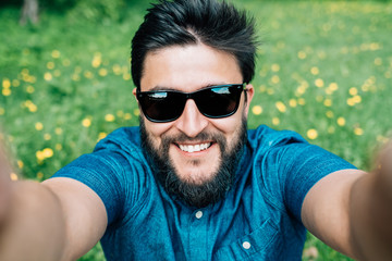 Man taking selfie in the forest