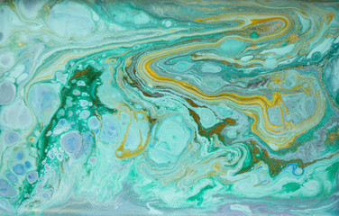 Marble abstract acrylic background. Marbling artwork texture. Agate ripple pattern. Gold powder.