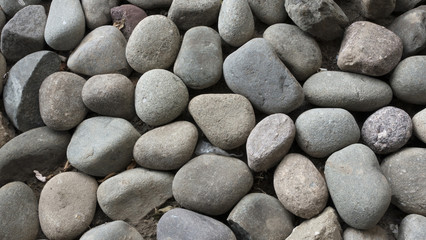 bed of round smooth rocks and stones