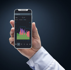 Modern style full screen cellular phone displayed with a man's hand holding it with light blue long sleeve shirt