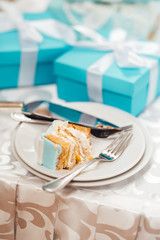 wedding cake with turquoise cakes