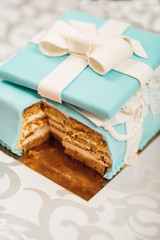 wedding cake with turquoise cakes