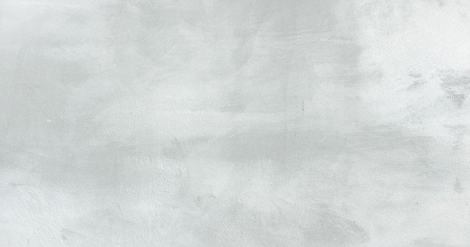 White washed painted textured abstract background with brush strokes in white and black shades. Abstract painting art backgrounds. Hand-painted texture.