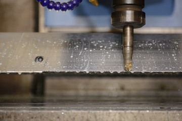 The CNC milling machine cutting the tire mold part with the index-able   ball end-mill tool.