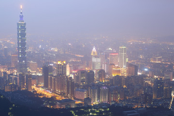 Aerial view of Taipei City, Taipei 101, Xinyi commercial area, riverside and skyscrapers in downtown in evening twilight ~ Scenery of foggy Taipei City with polluted hazy air (PM 2.5 "Beyond Index" )