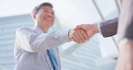 business people shake hands