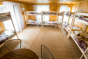 Wooden bunks in summer camp - obrazy, fototapety, plakaty