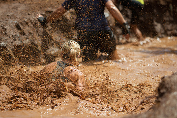 Mud race runners,during extreme obstacle races