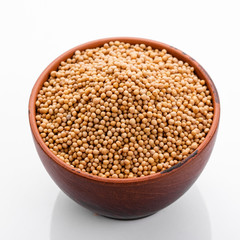 fragrant grains of mustard on a white background
