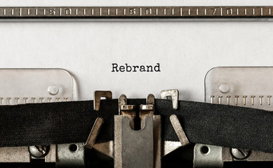 Text Rebrand typed on retro typewriter