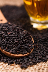 fresh sesame seeds on a rustic background