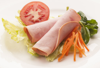 Salad and turkey ham
