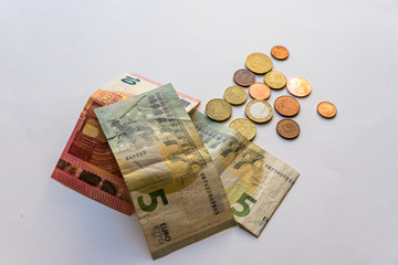 piggy bank with coins and bills