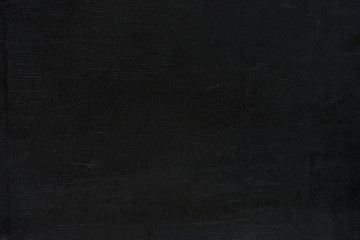 Fototapeta premium dark black textured stucco cement wall surface
