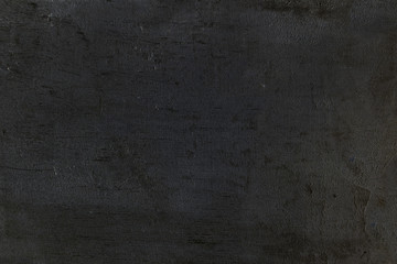 Fototapeta premium dark black textured stucco cement wall surface