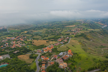 Fototapeta na wymiar Cities in the valley at the foot of Monte Titano in San Marino