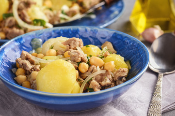 Stewed lamb with potatoes and chikpeas.