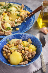 Stewed lamb with potatoes and chikpeas.