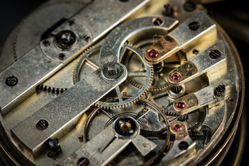 Detail view of the clockwork of an old pocket watch